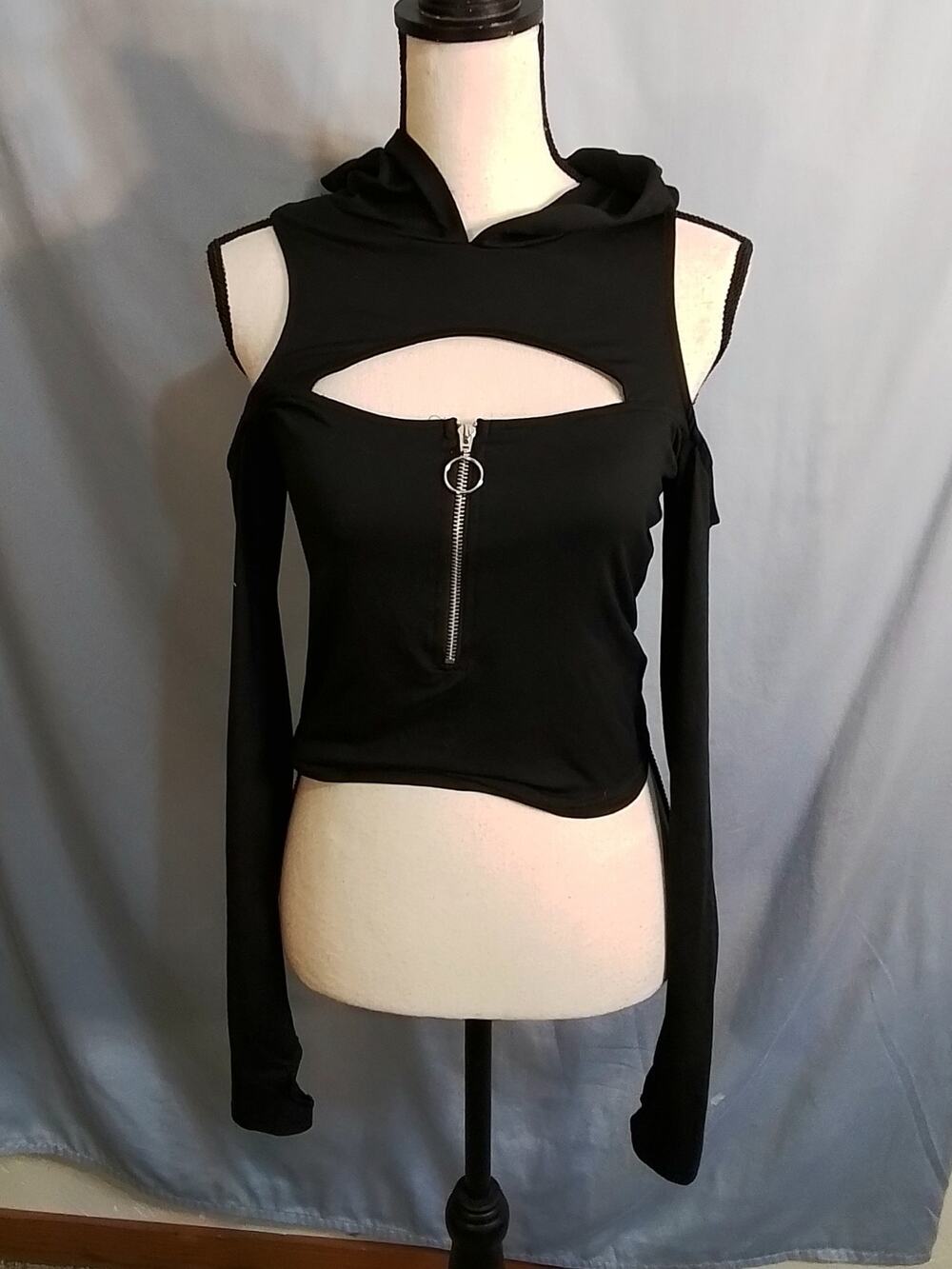 Cosmic Aura black cold shoulder crop top hoodie.